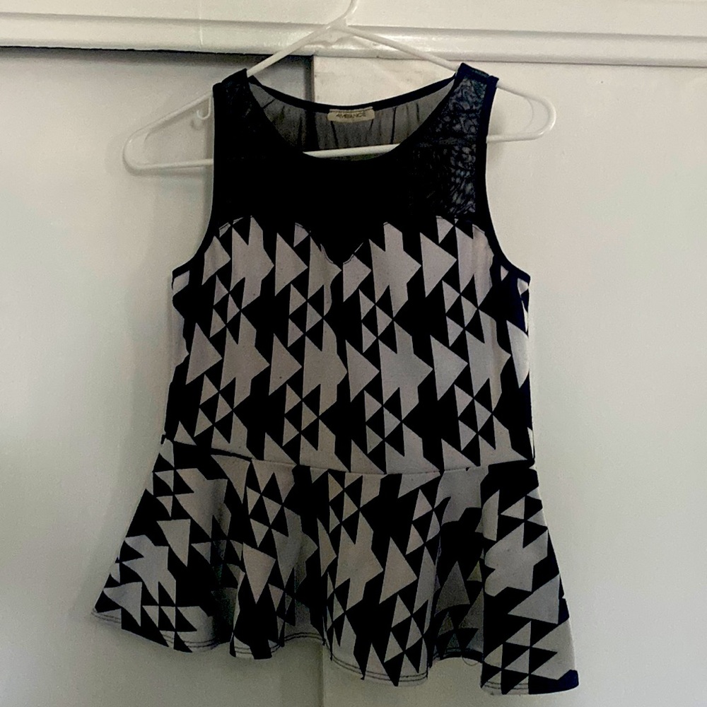 Black and white tank top this is size M but fits like a L very  comfortable
